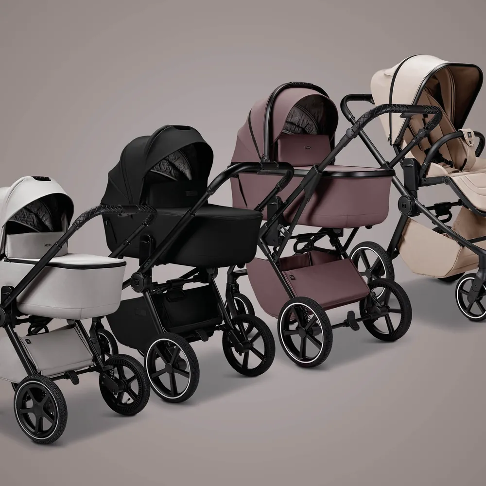 Vier MOON Kombi-Kinderwagen mit Babywanne in verschiedenen Farben nebeneinander